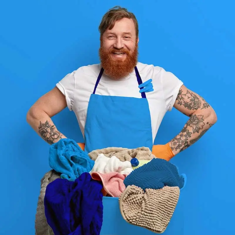 Man smiling while using the large capacity dryers.